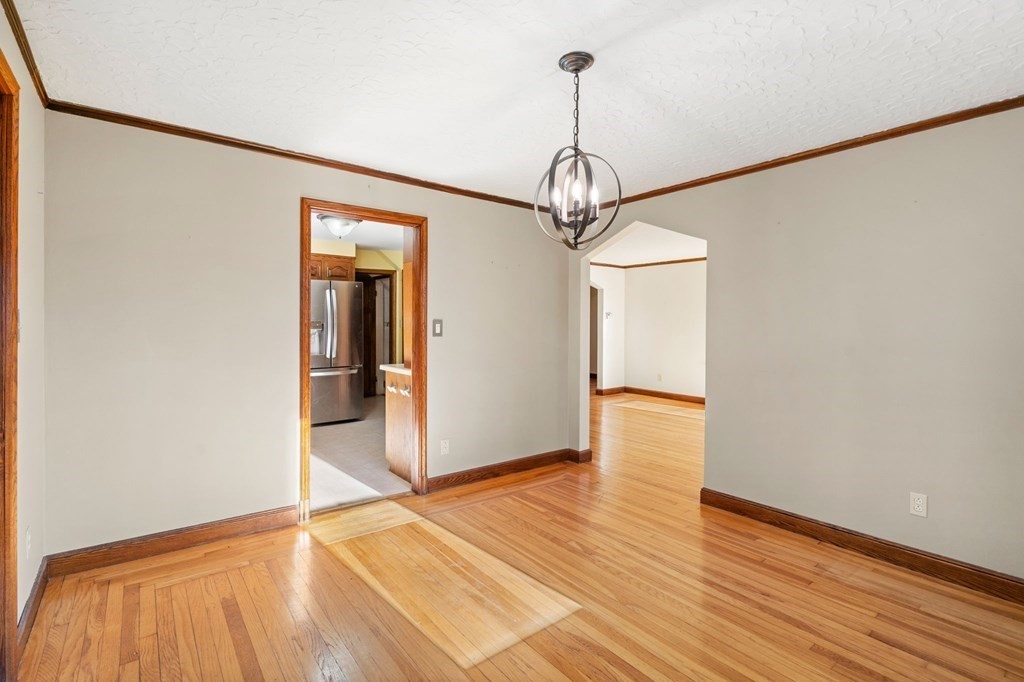 3 Old English Road Worcester, MA 01609 - Photo 8 of 36 a view of empty room with wooden floor and sink
