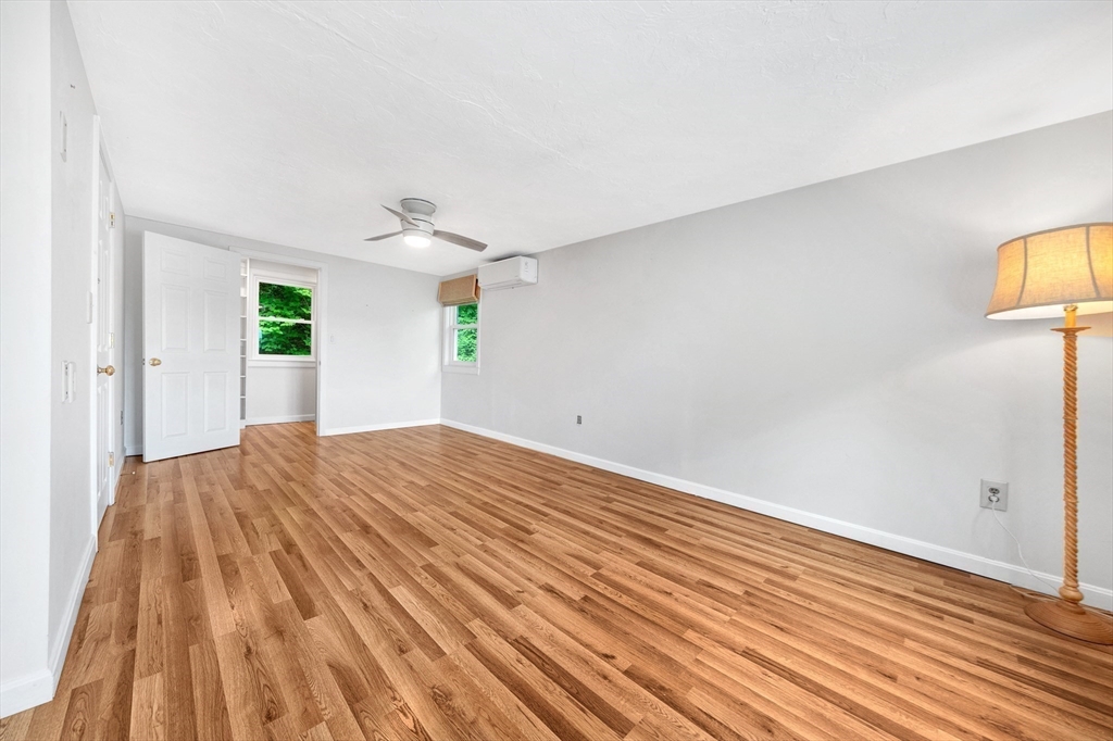 118 Woolford Road Wrentham, MA 02093 - Photo 28 of 41 a view of empty room with wooden floor and fan