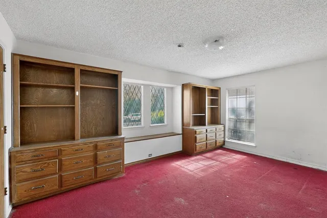 a room with furniture and a window