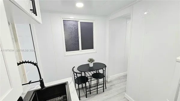 a room with table and chair