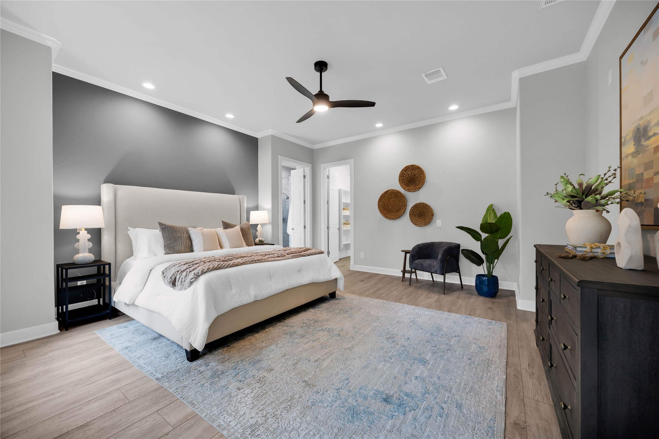 2800 Waymaker Way, Unit 36 Austin, TX 78746 - Photo 13 of 40 a bedroom with bed and a chandelier