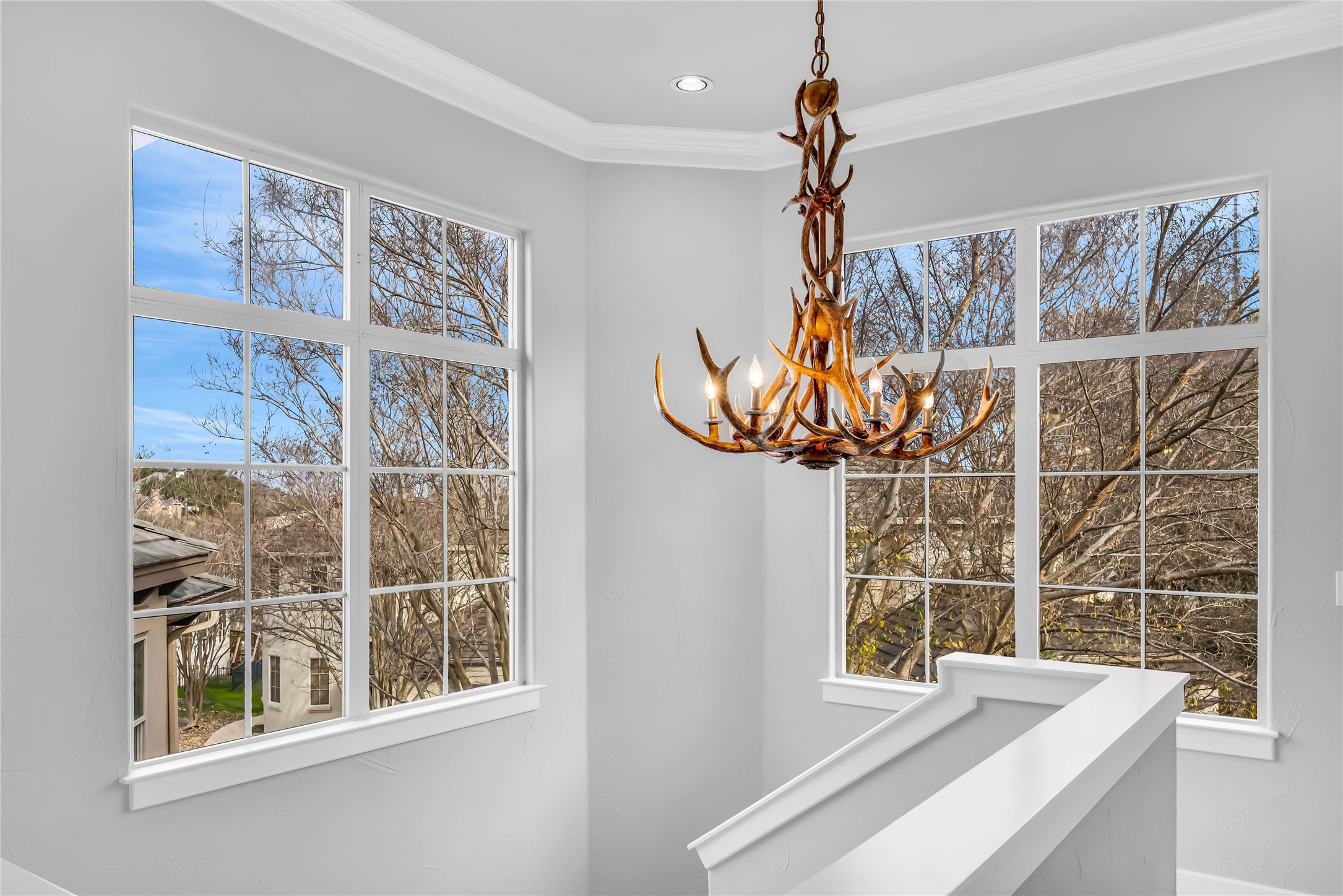 2800 Waymaker Way, Unit 36 Austin, TX 78746 - Photo 18 of 40 a front door view of a house with a chandelier