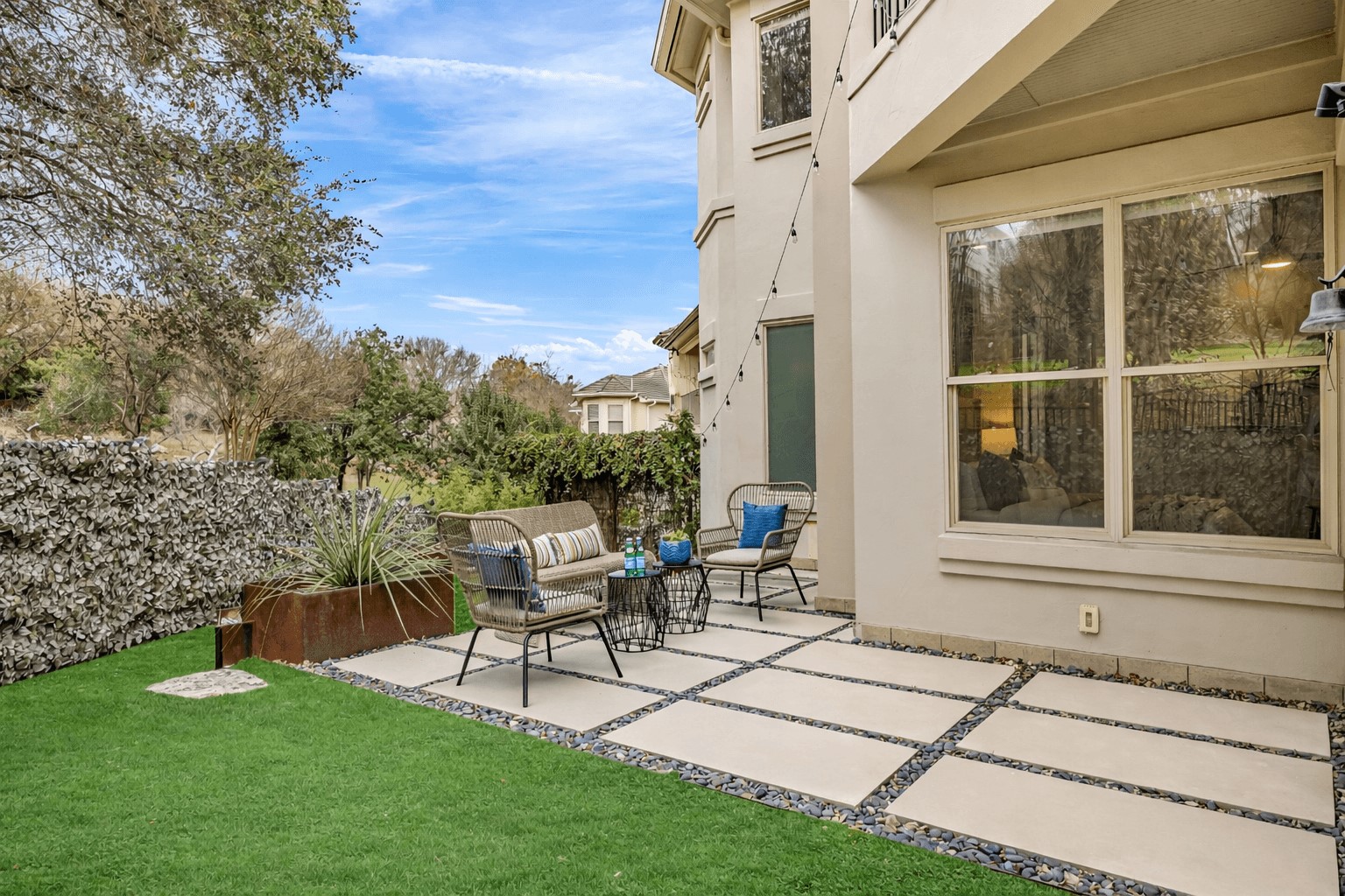 2800 Waymaker Way, Unit 36 Austin, TX 78746 - Photo 33 of 40 a garden view with a seating space