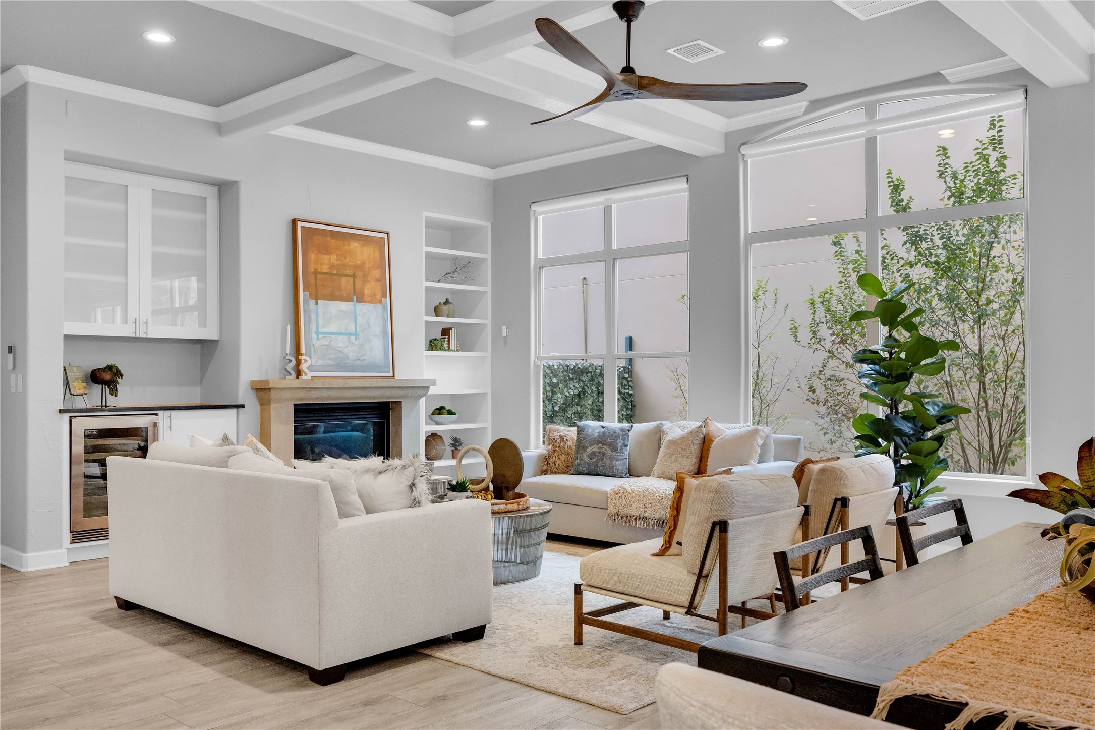 2800 Waymaker Way, Unit 36 Austin, TX 78746 - Photo 5 of 40 a living room with furniture potted plant and a fireplace