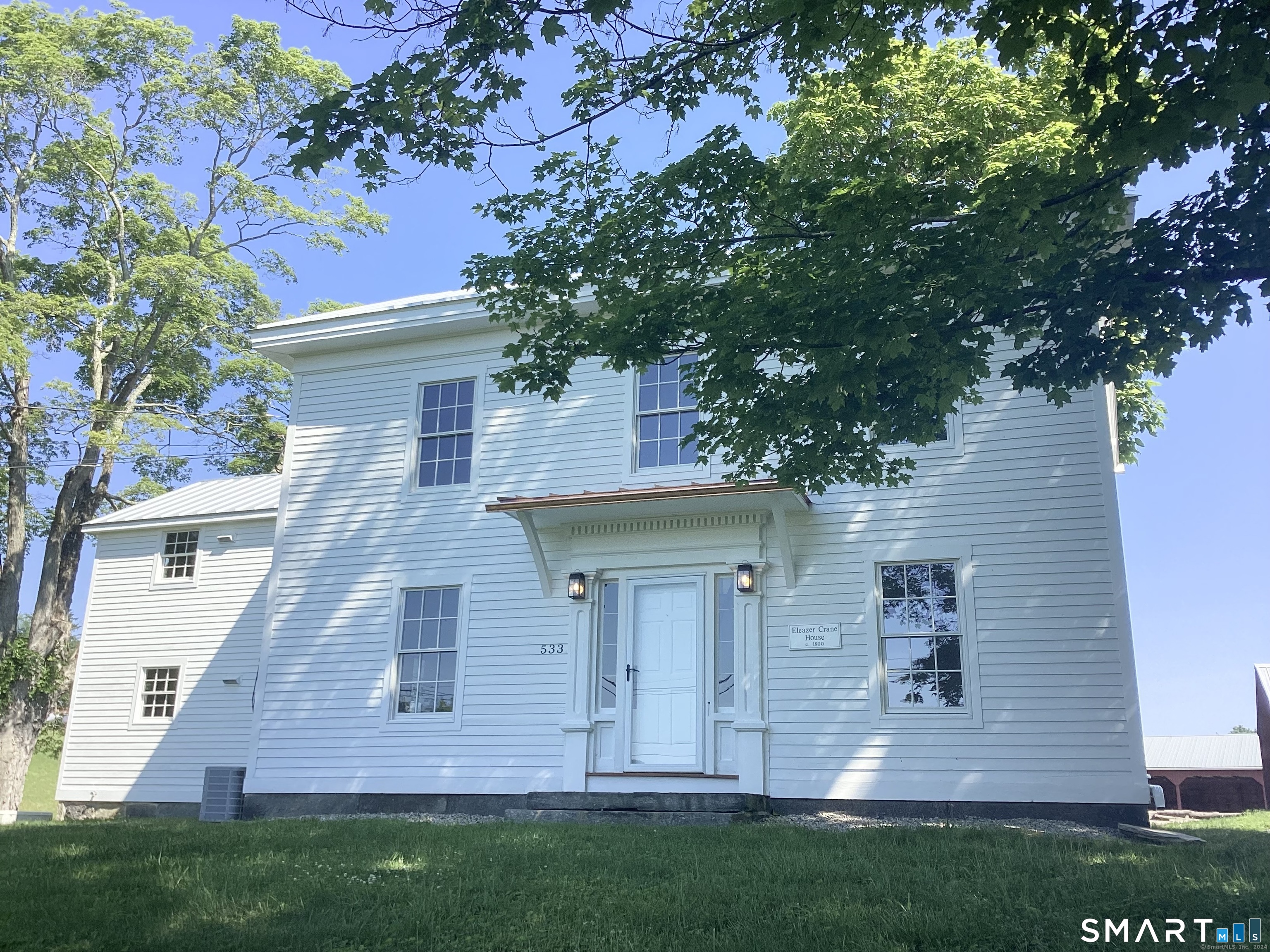 533 Weekeepeemee Road Woodbury, CT 06798 - Photo 2 of 17 front view of a house with a yard