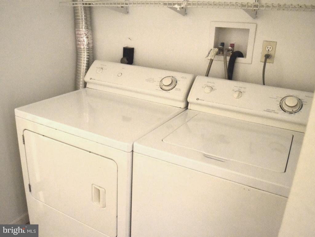 7703 Dover Road Glen Burnie, MD 21060 - Photo 17 of 25 a utility room with dryer and washer