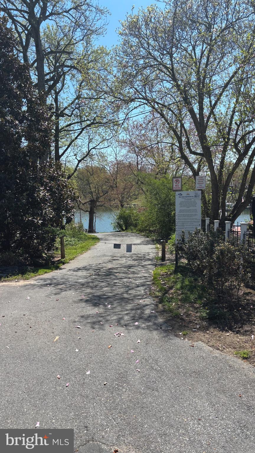 7703 Dover Road Glen Burnie, MD 21060 - Photo 18 of 25 a backyard of a house with lots of green space