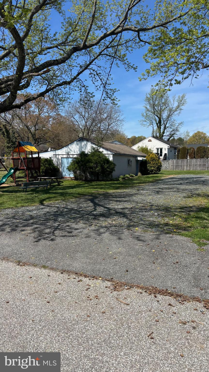 7703 Dover Road Glen Burnie, MD 21060 - Photo 22 of 25 a view of a yard in front of a house