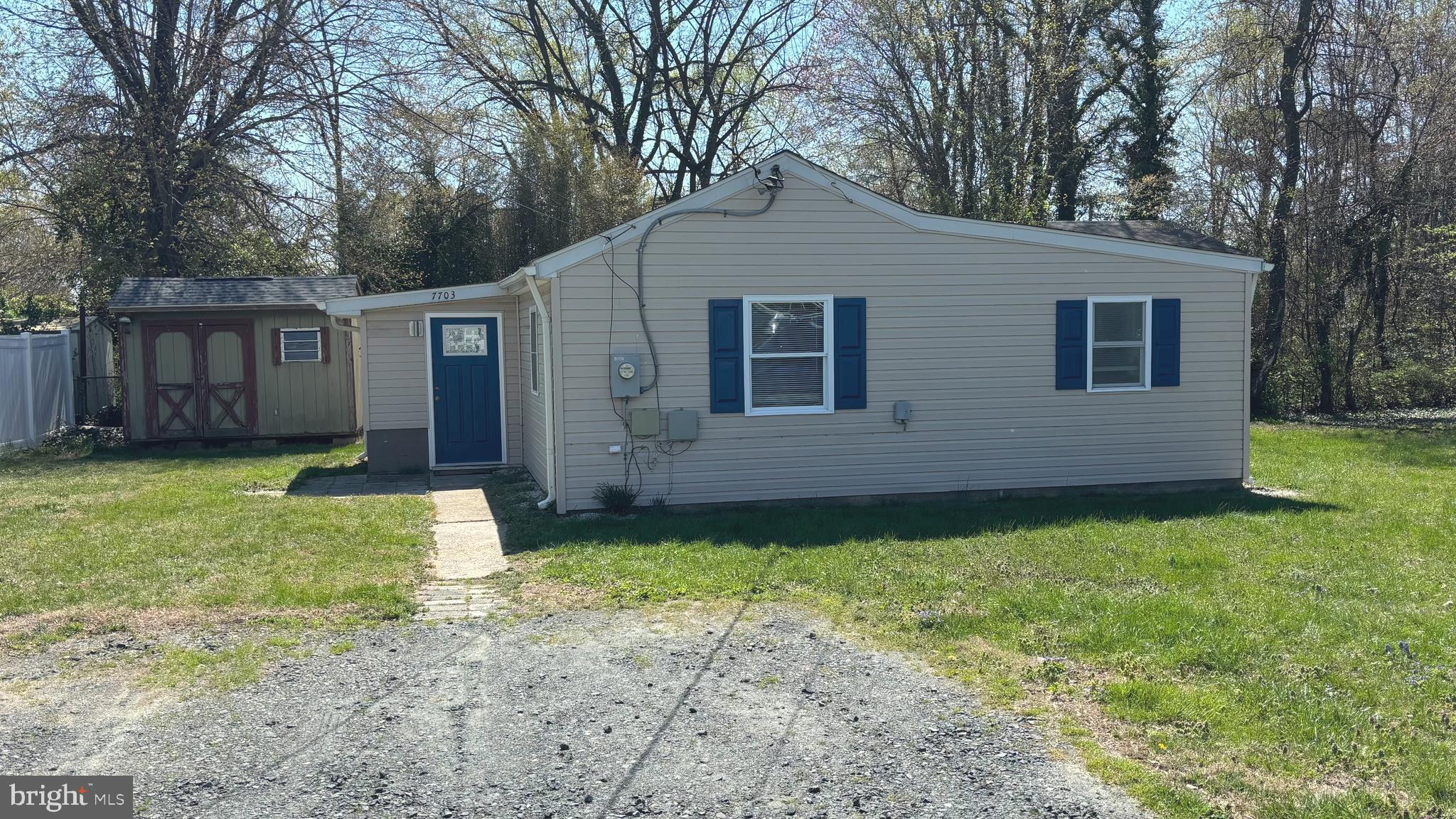 7703 Dover Road Glen Burnie, MD 21060 - Photo 3 of 25 a view of a house with a yard