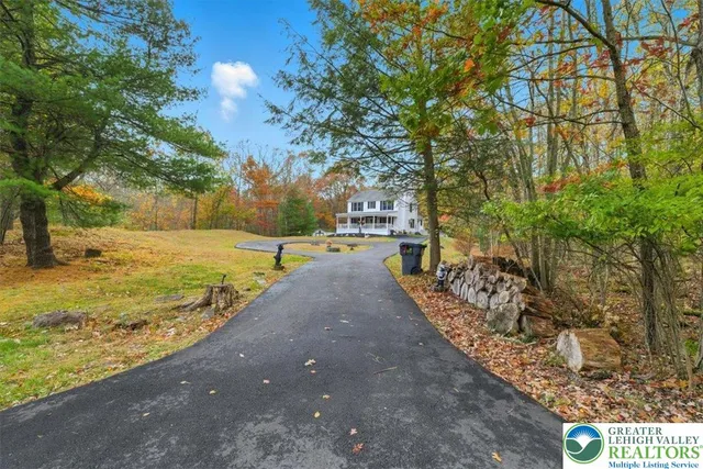 a view of a yard with an trees