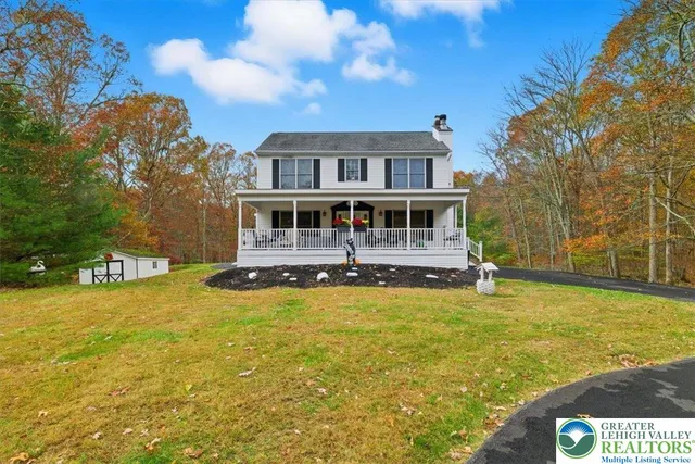 a view of a swimming pool with a lounge chairs