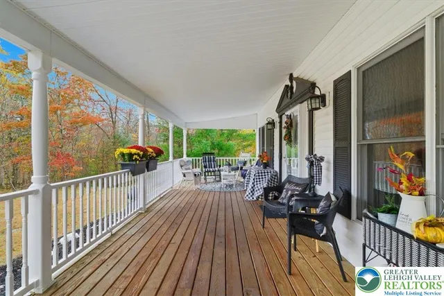 a view of balcony with chairs