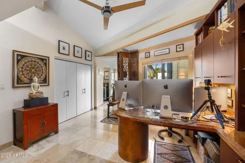 a view of a workspace with furniture
