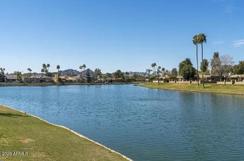 a view of a lake with houses