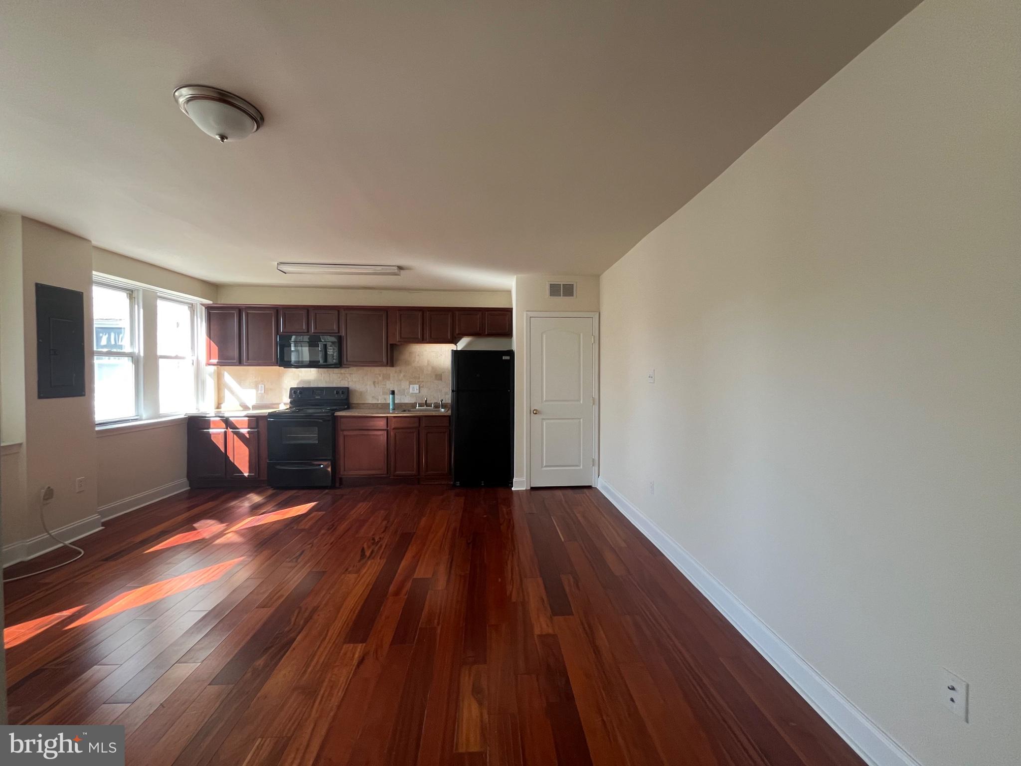 740 Vernon Road Philadelphia, PA 19119 - Photo 8 of 13 Spacious room with warm wood floors.