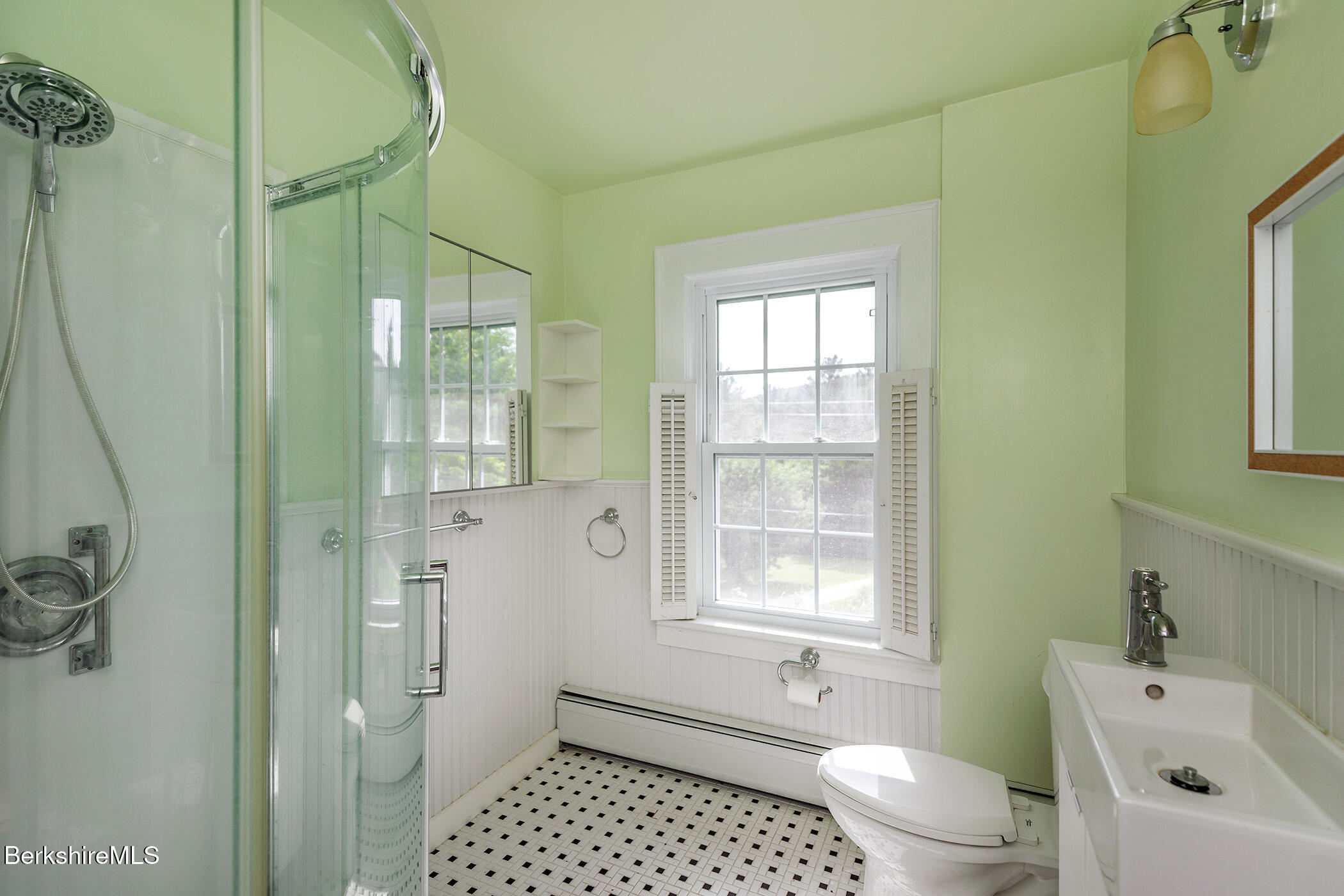 143 White Hollow Road Salisbury, CT 06039 - Photo 16 of 36 a bathroom with a sink a toilet and shower