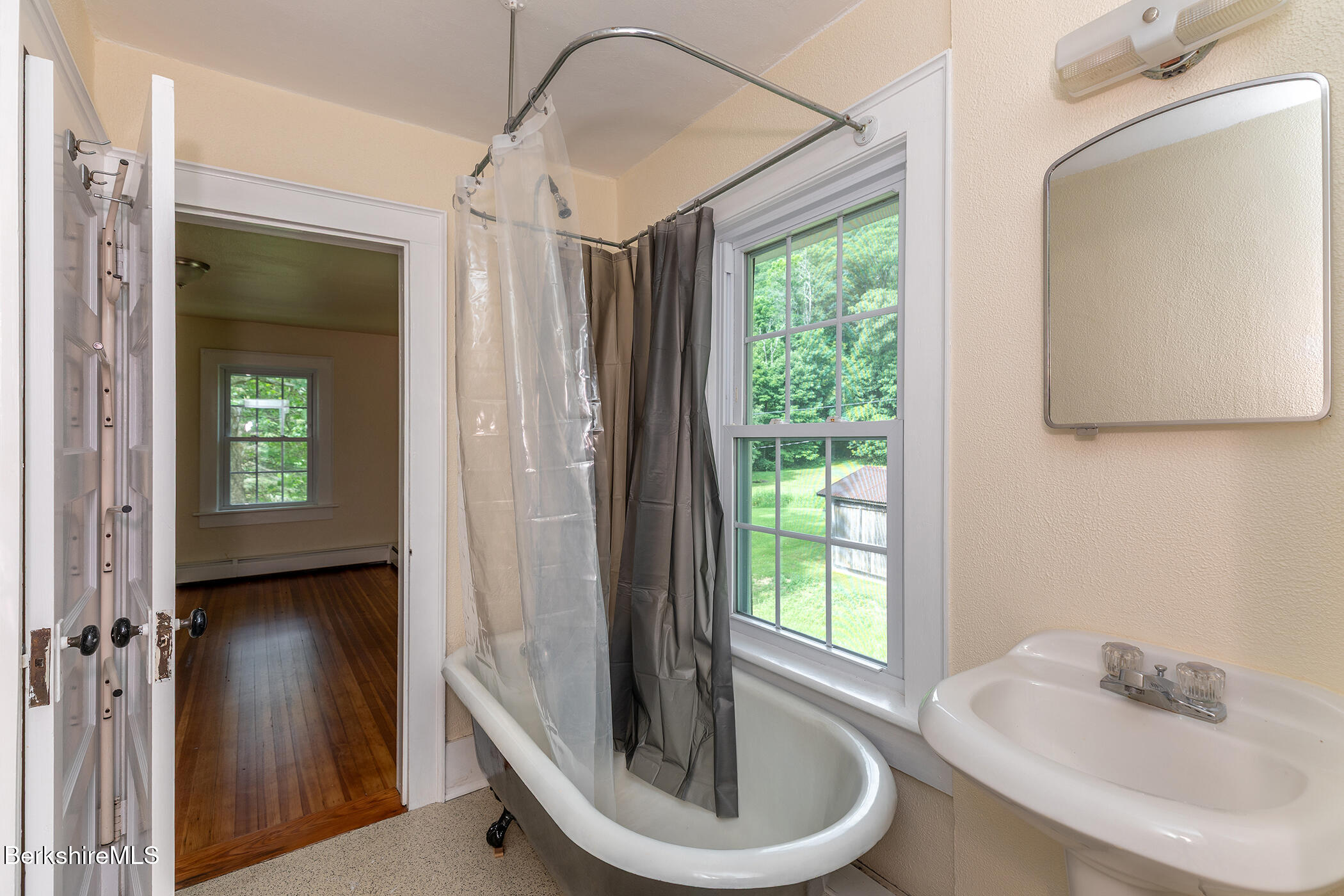 143 White Hollow Road Salisbury, CT 06039 - Photo 19 of 36 a bathroom with a sink and a mirror