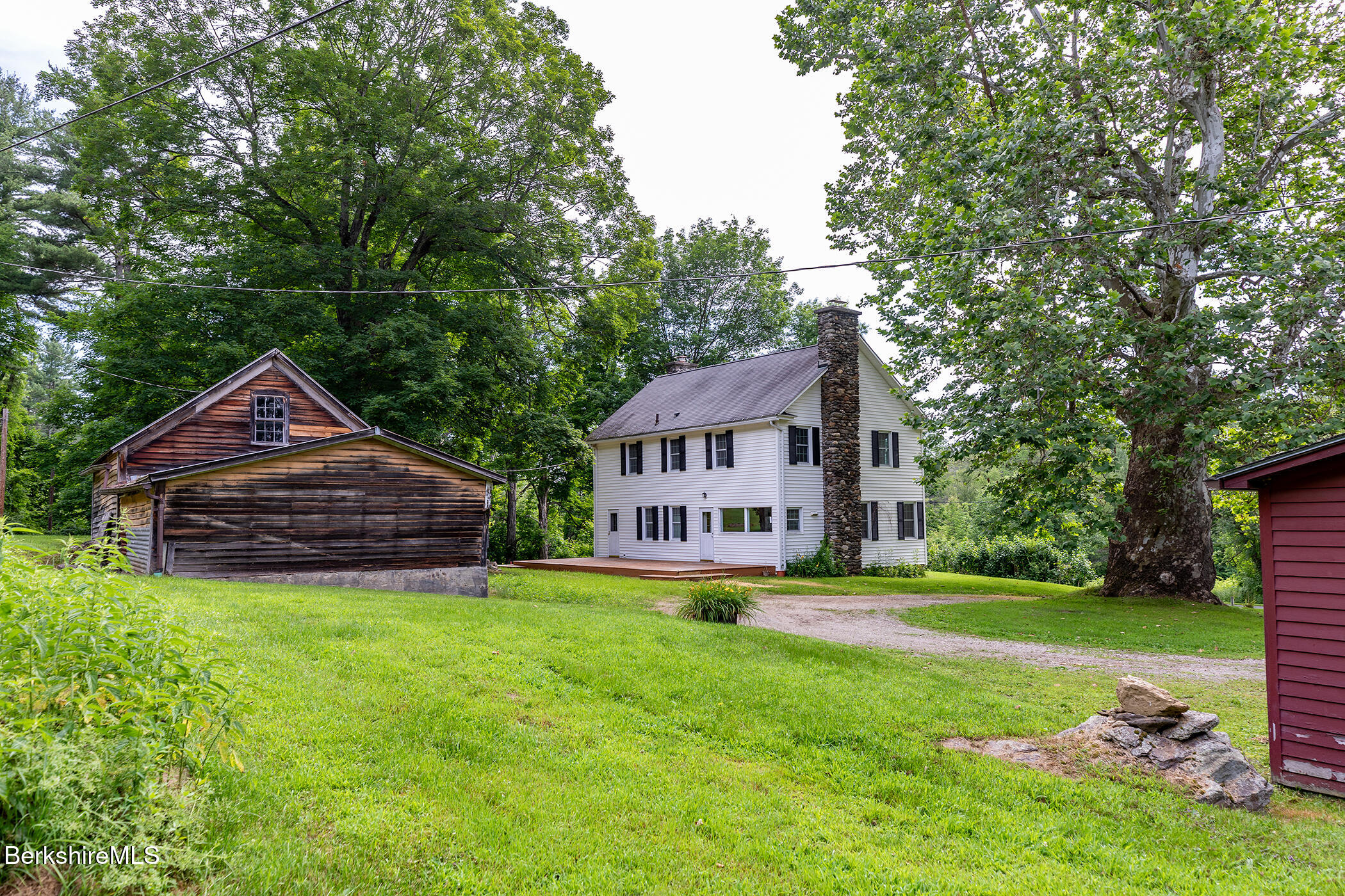 143 White Hollow Road Salisbury, CT 06039 - Photo 21 of 36 a house with garden in front of it
