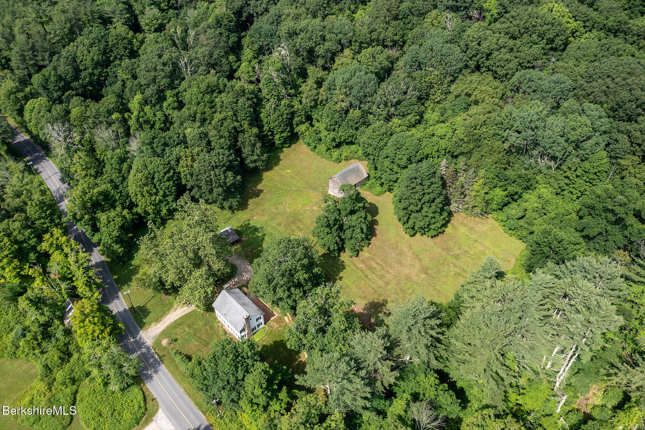 143 White Hollow Road Salisbury, CT 06039 - Photo 31 of 36 a view of a garden with a lake
