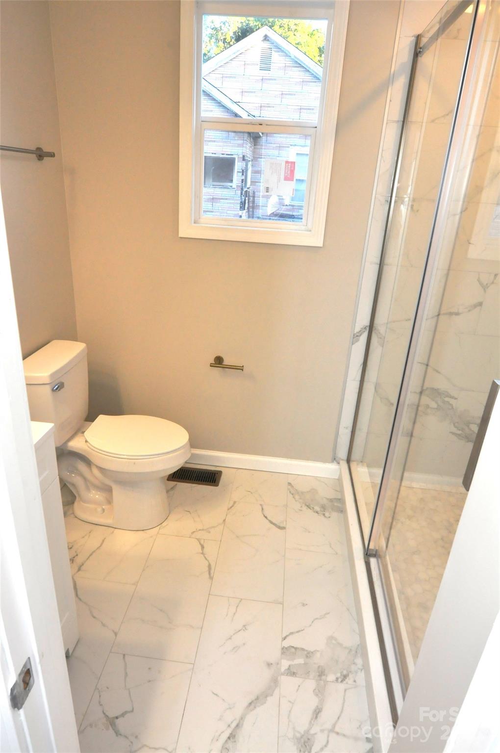 538 2nd Street Chester, SC 29706 - Photo 13 of 17 a bathroom with a toilet and a shower