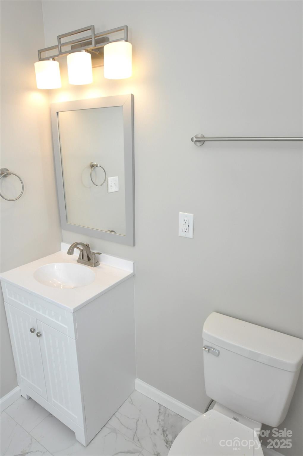 538 2nd Street Chester, SC 29706 - Photo 15 of 17 a bathroom with a toilet sink and mirror