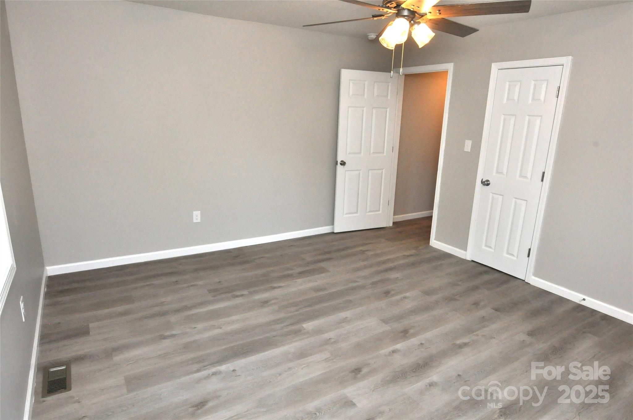 538 2nd Street Chester, SC 29706 - Photo 17 of 17 wooden floor in an empty room with a window