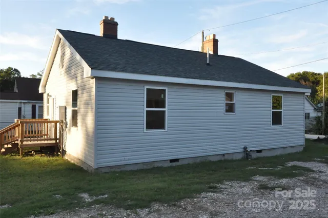 a backyard of a house with lots of green space