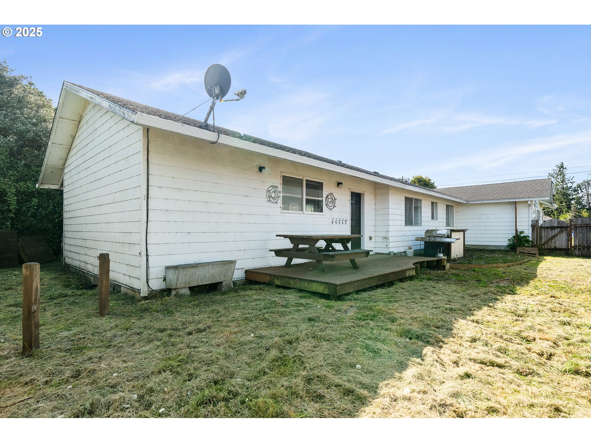 1806 8th Street Tillamook, OR 97141 - Photo 26 of 31 a view of a house with backyard