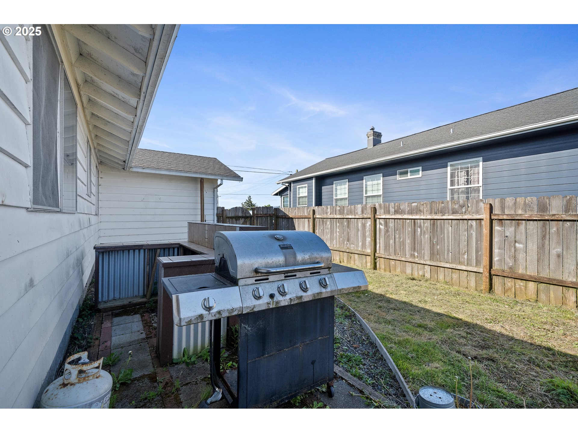 1806 8th Street Tillamook, OR 97141 - Photo 28 of 31 a view of a house with a deck