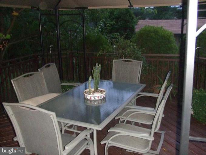 1818 Willann Road Rosedale, MD 21237 - Photo 2 of 25 a view of a table and chairs in patio