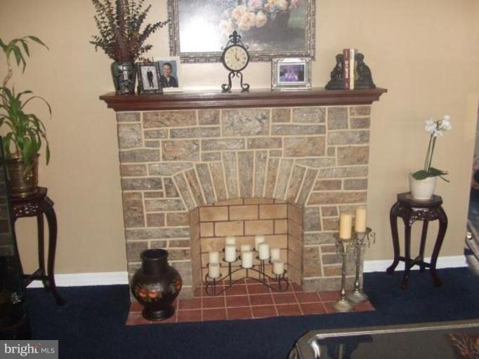 1818 Willann Road Rosedale, MD 21237 - Photo 11 of 25 a bathroom with a sink a mirror and shower