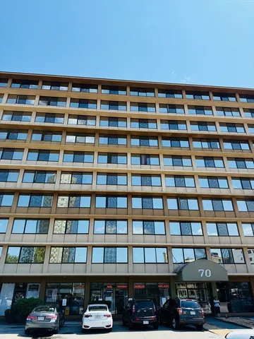 a front view of a building with a street