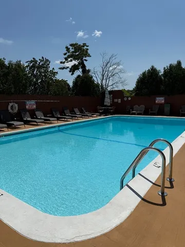 a view of a swimming pool and outdoor space
