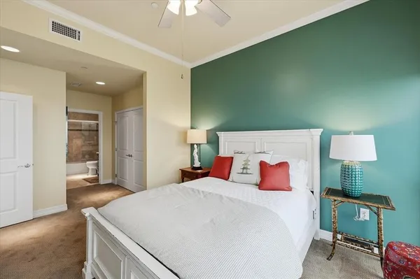 a bedroom with a bed and a table