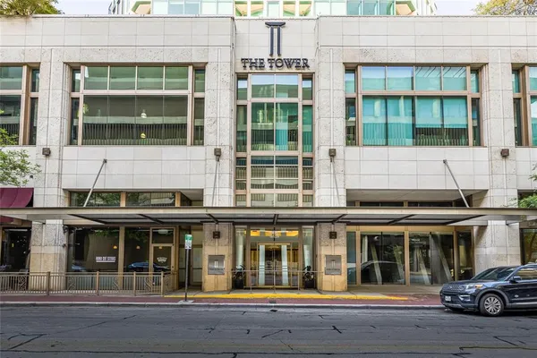 a view of building with large windows