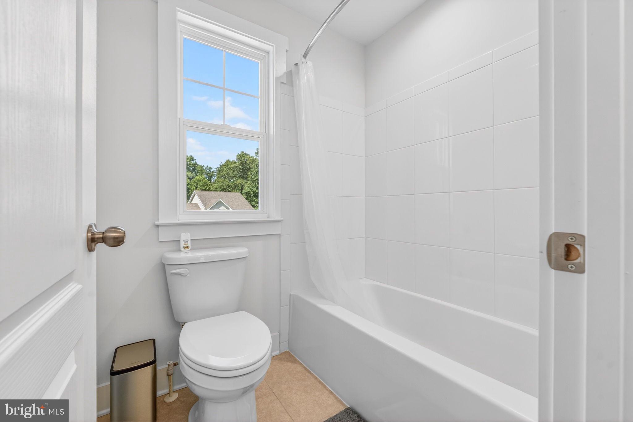 30 Range Road North East, MD 21901 - Photo 51 of 73 a bathroom with a granite countertop toilet a sink and bathtub