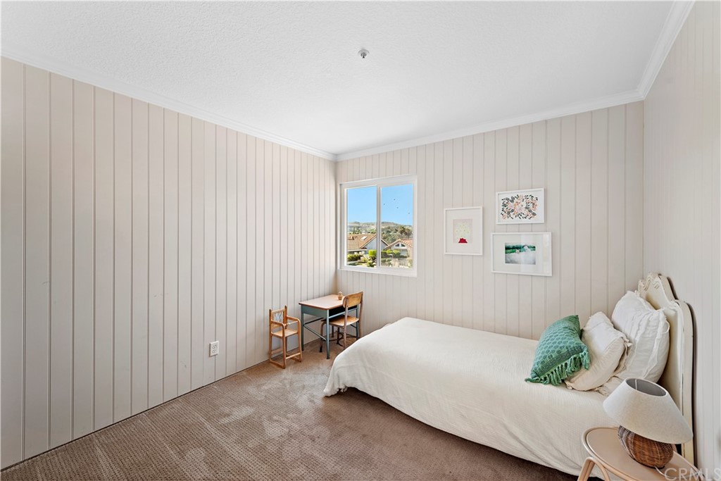 2899 Riachuelo San Clemente, CA 92673 - Photo 16 of 22 a bed room with a bed and a chair