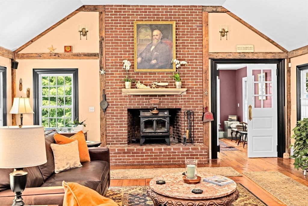 71 High Street Canton, MA 02021 - Photo 11 of 42 a living room with furniture and a fireplace