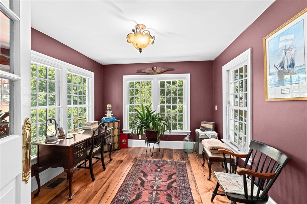 71 High Street Canton, MA 02021 - Photo 13 of 42 a living room with furniture and a large window