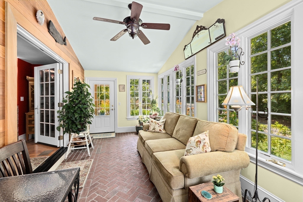 71 High Street Canton, MA 02021 - Photo 20 of 42 a living room with furniture and a large window