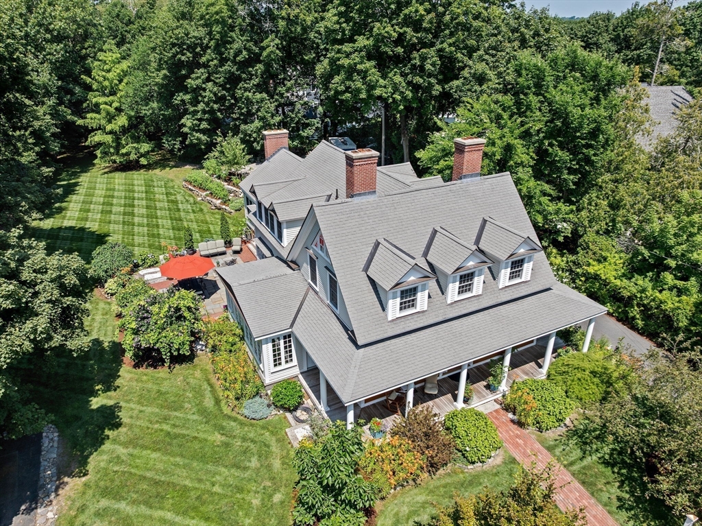 71 High Street Canton, MA 02021 - Photo 2 of 42 an aerial view of a house with a garden and trees
