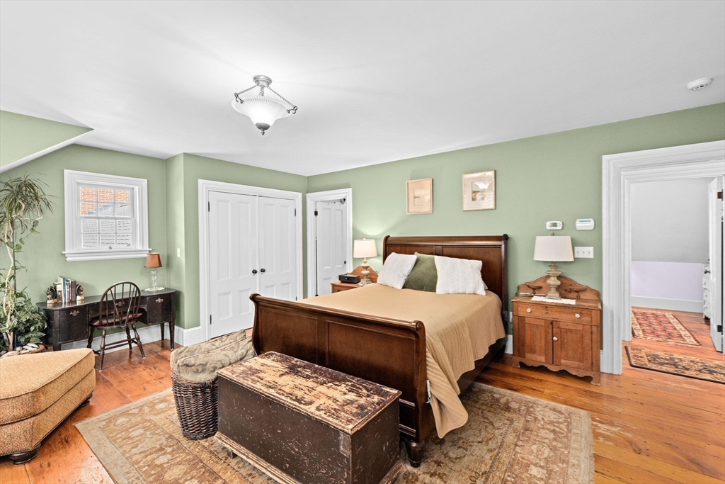71 High Street Canton, MA 02021 - Photo 23 of 42 a bedroom with a bed a couch and dresser