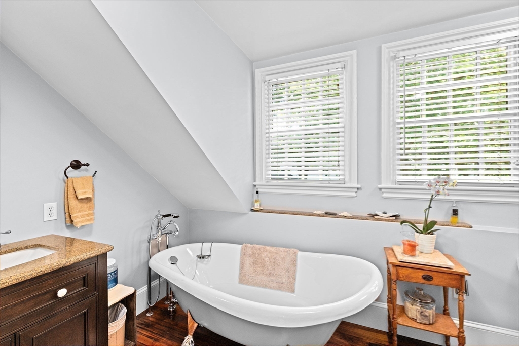 71 High Street Canton, MA 02021 - Photo 25 of 42 a bathroom with a tub sink and window