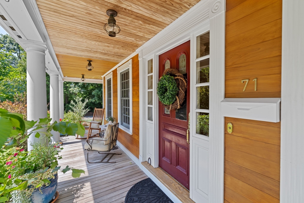 71 High Street Canton, MA 02021 - Photo 3 of 42 a porch with seating space