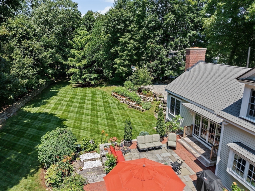 71 High Street Canton, MA 02021 - Photo 33 of 42 an aerial view of a house with garden space and sitting area