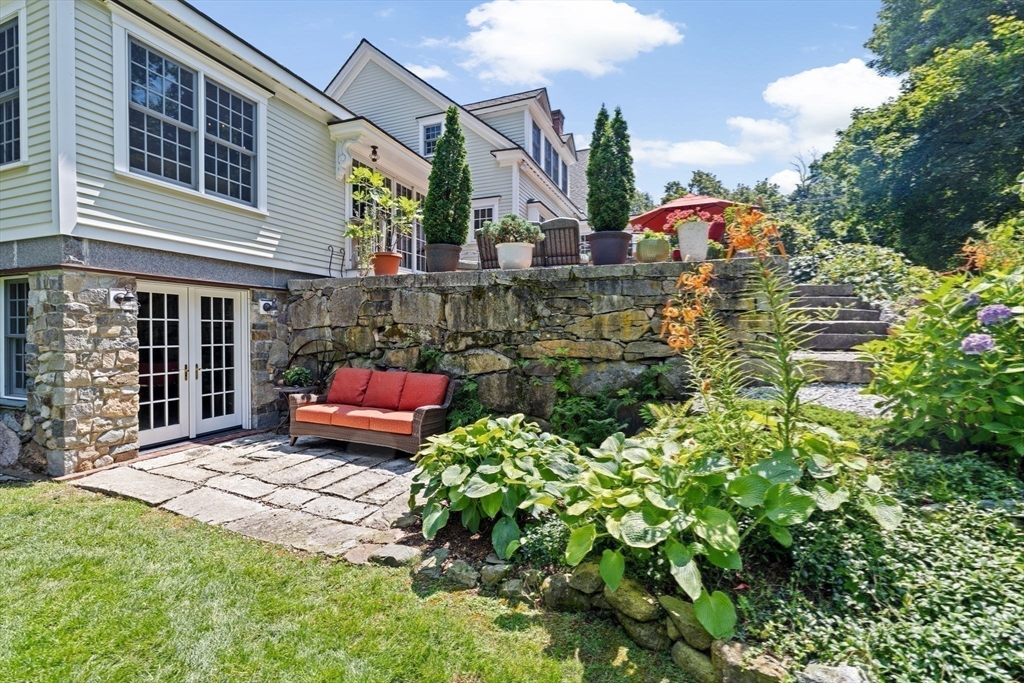 71 High Street Canton, MA 02021 - Photo 36 of 42 a view of a house with a garden