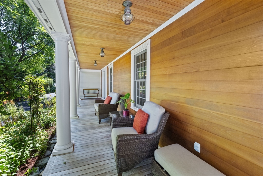 71 High Street Canton, MA 02021 - Photo 4 of 42 a view of a patio with couches and pool