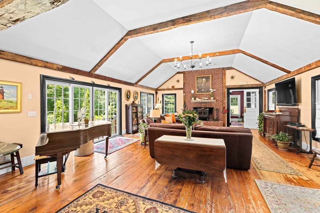 71 High Street Canton, MA 02021 - Photo 10 of 42 a living room with furniture and a large window