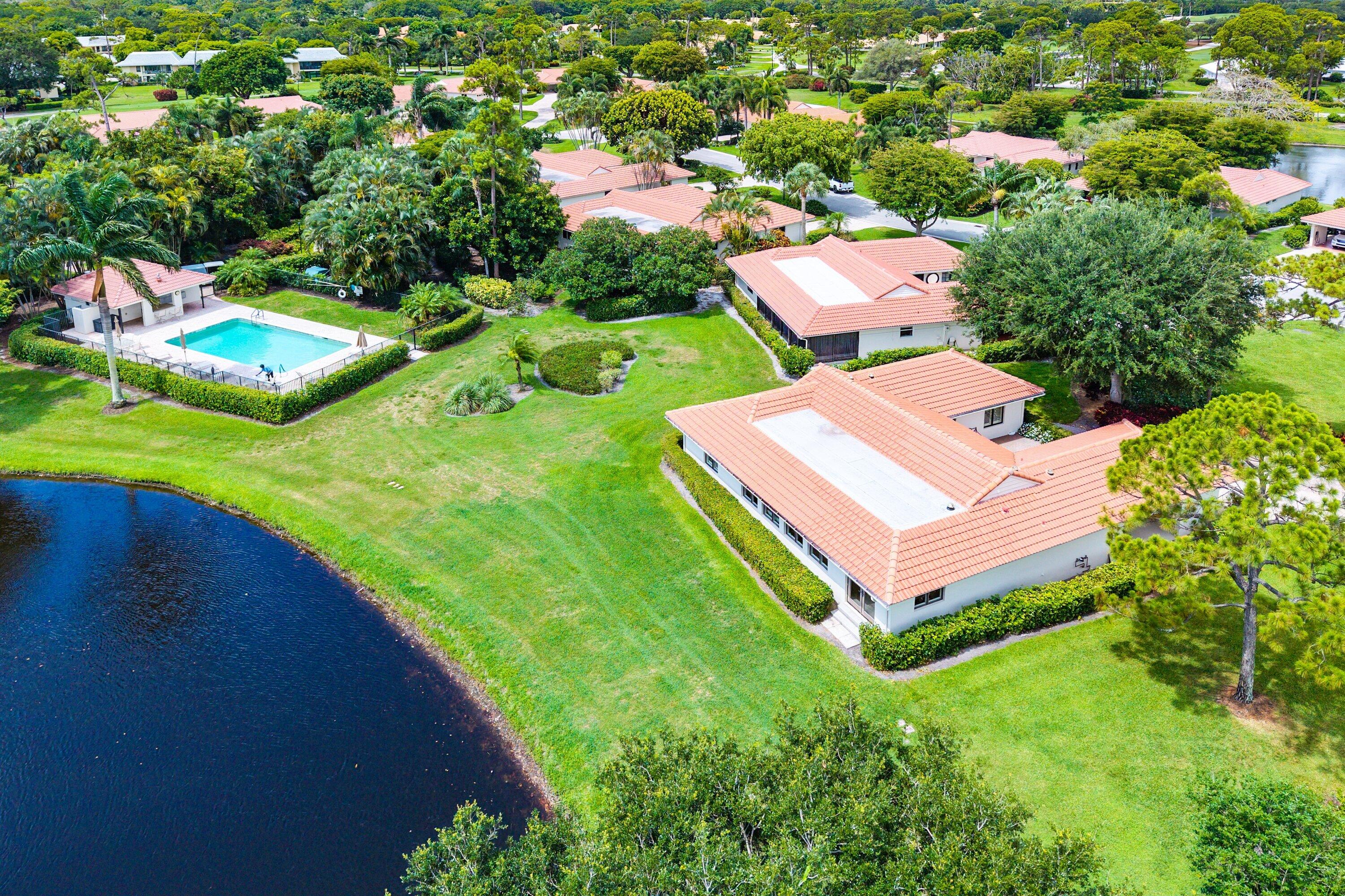 4365 Shell Drake Lane Boynton Beach, FL 33436 - Photo 35 of 56 an aerial view of a house with a yard