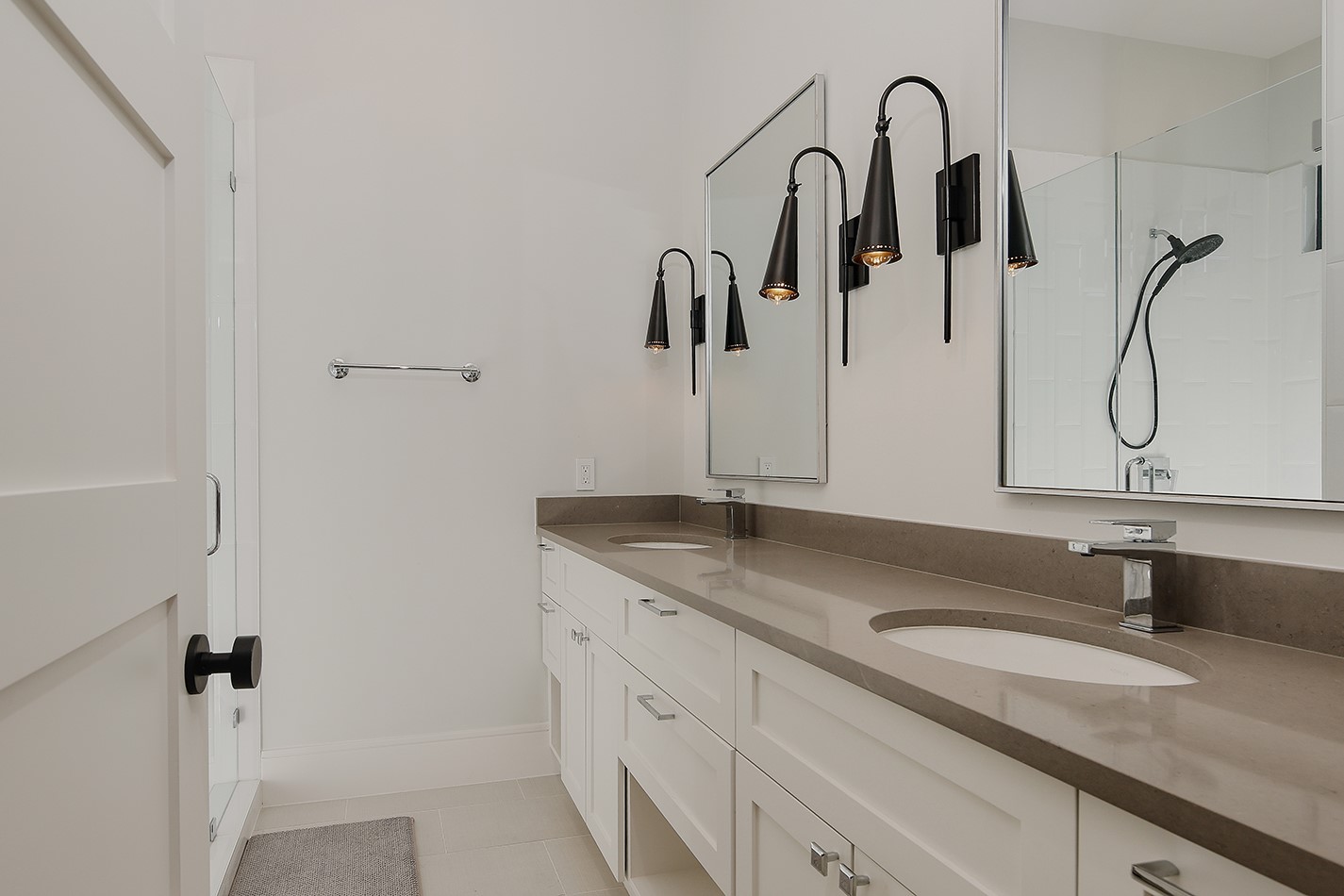 425 Copa Palm Loop Montgomery, TX 77316 - Photo 33 of 39 a bathroom with a granite countertop sink and a mirror